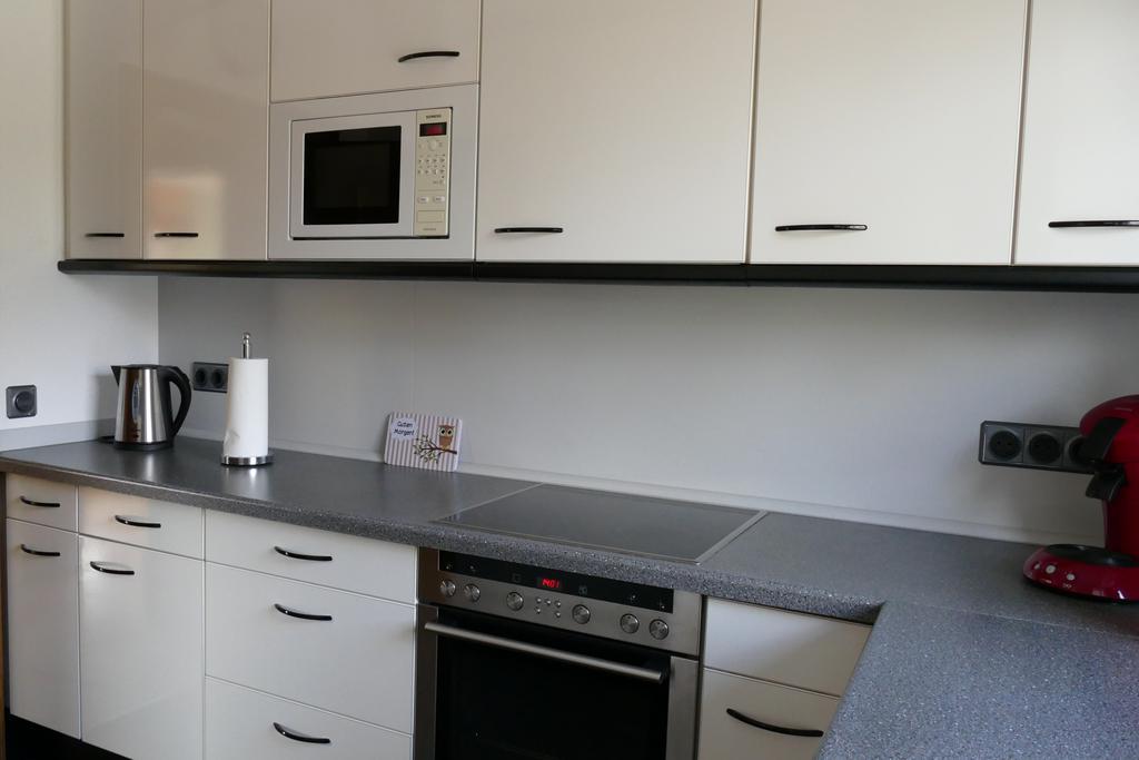 Ferienwohnung Eulenturm Ксантен Стая снимка